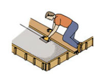 Draw the groover along the edge of a 2 x 8 to create contraction joints.
